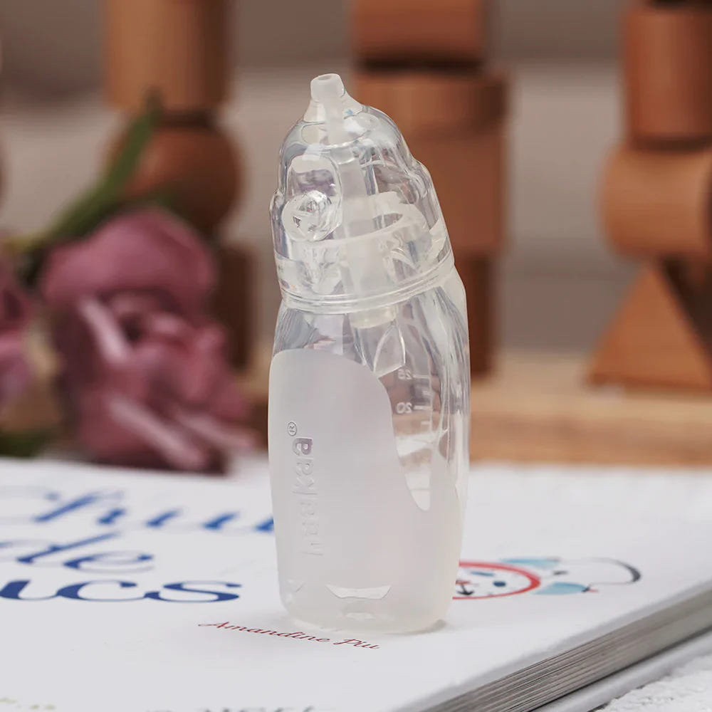 Haakaa Silicone Penguin Nasal Aspirator for babies - gentle, effective oral care tool in a cute penguin design.