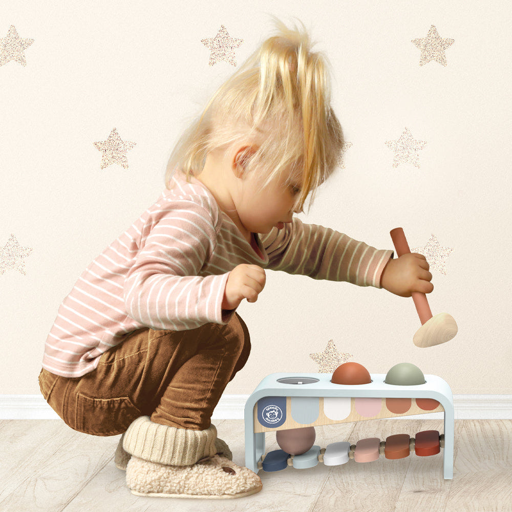 Xylo Bench: Colorful early learning toy for babies, promoting motor skills and creativity in a safe design.