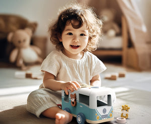 "Van shape sorter for babies, promoting early learning and motor skills development, viewed from angle 3."
