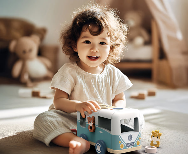 "Van shape sorter for babies, promoting early learning and motor skills development, viewed from angle 3."