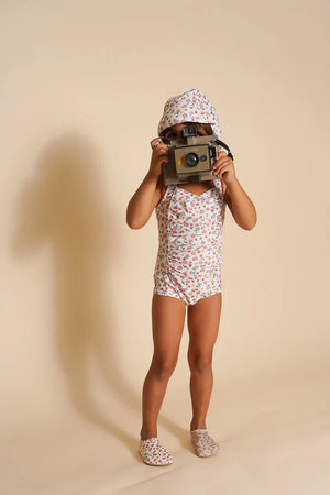Vintage girls' 1 piece swimsuit in Sunset Meadow, UPF protection, made from recycled materials, angle view 4.