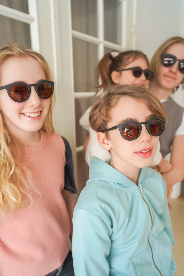 Classic sustainable sunglasses for kids aged 3-8, plant-based, bendable, polarized, shown at angle 22.