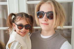 Classic sustainable sunglasses for kids aged 3-8, plant-based, bendable, and polarized, shown at angle 21.
