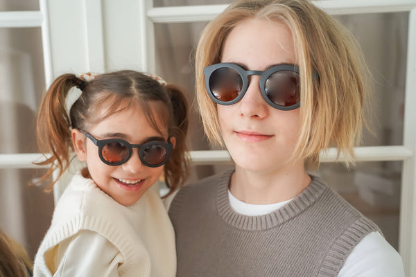 Classic sustainable sunglasses for kids aged 3-8, plant-based, bendable, and polarized, shown at angle 21.