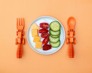 Tractor utensils for babies, perfect for feeding and nursing, shown at angle 13.