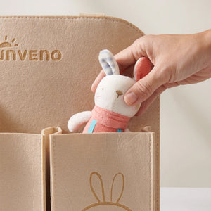 Baby car seat hanging organizer for travel essentials, shown from angle 4, keeping items organized and accessible.