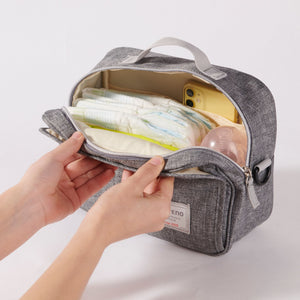 Stylish diaper changing bag at angle 3, perfect for parents on the go.