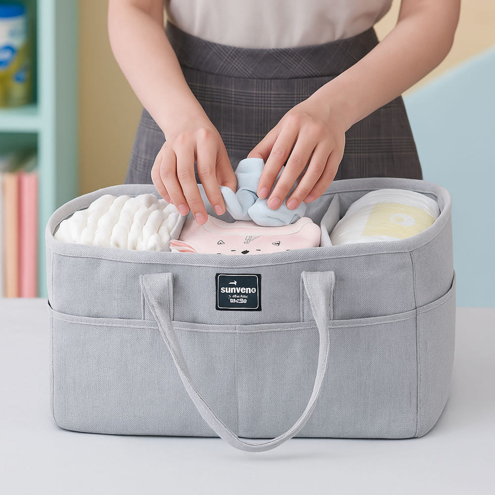 Diaper caddy organizer for baby strollers, keeping essentials tidy and accessible for parents on the go.