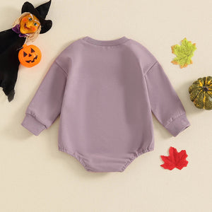 Baby Halloween romper with pumpkin face print, long sleeves, perfect for girls and boys. Angle 5 view.