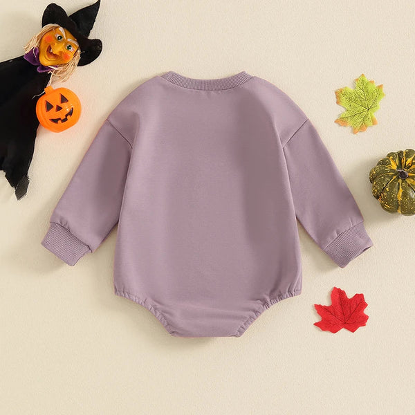 Baby Halloween romper with pumpkin face print, long sleeves, perfect for girls and boys. Angle 5 view.