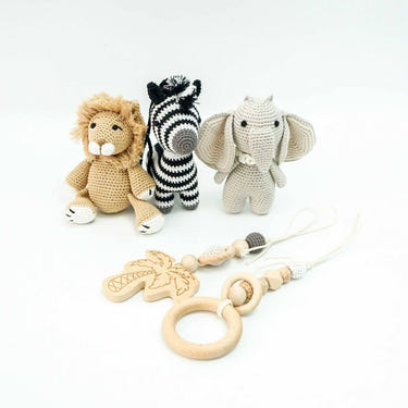 Handmade crochet safari toys for baby gym, perfect for playful and safe infant exploration.