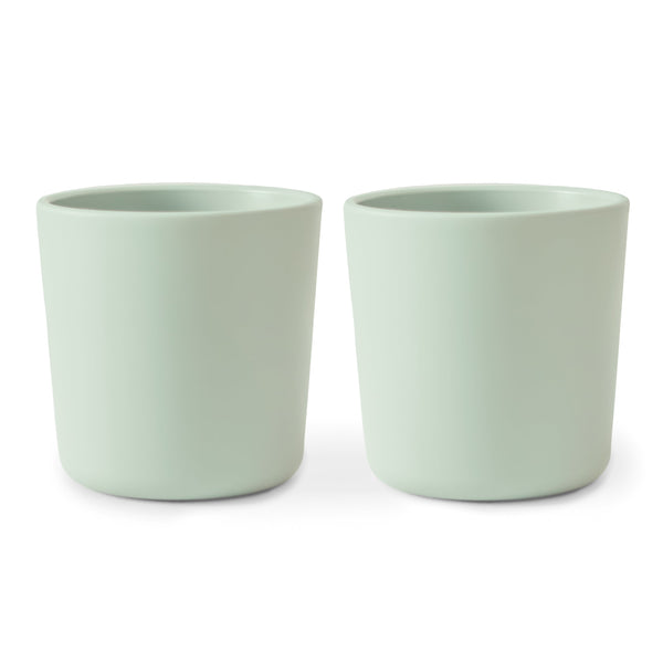 Colorful baby dinnerware cups in various sizes, perfect for mealtime fun and learning. Angle view showcasing design.