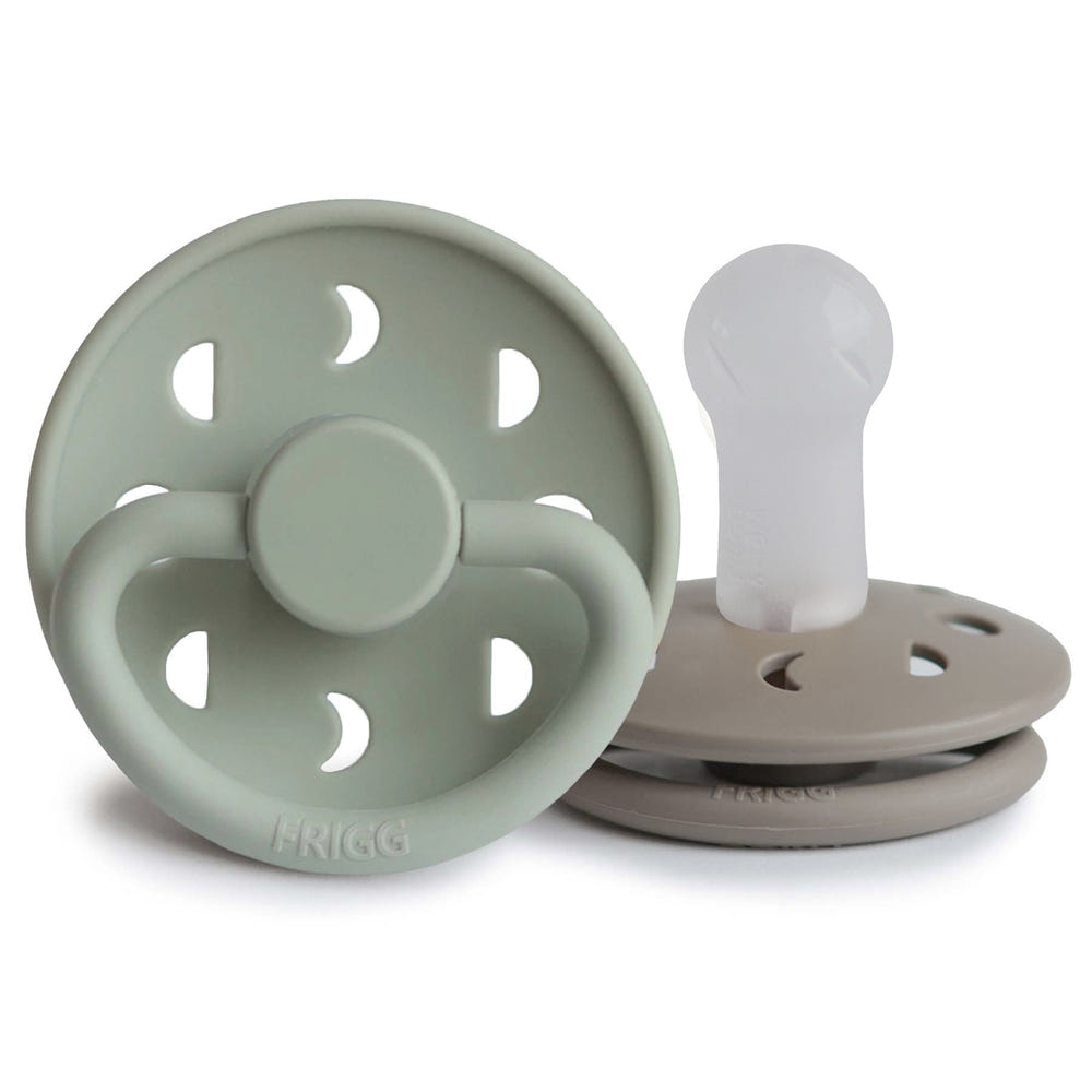 FRIGG Moon Silicone Pacifier 2-Pack in soft colors, perfect for soothing babies comfortably and safely.