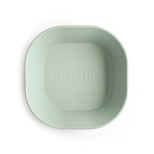Square dinnerware bowls for babies, angled view showcasing vibrant colors and safe, durable design.