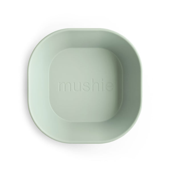 Square dinnerware bowls for babies, angled view showcasing vibrant colors and safe, durable design.