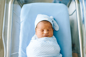 Bamboo Newborn Nest by Samuel, cozy and eco-friendly, perfect for newborns. Angle 2 view showcasing design and comfort.
