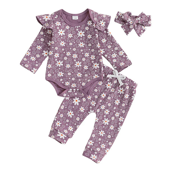 Baby girl floral print romper, long pants, and headband set for spring and fall outfits, angle view.