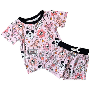 Oogie pink pocket short set for babies, perfect for playtime and comfort.