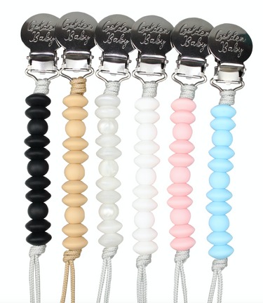 Jeanie Clip in solid colors - stylish and functional pacifier clip for babies.