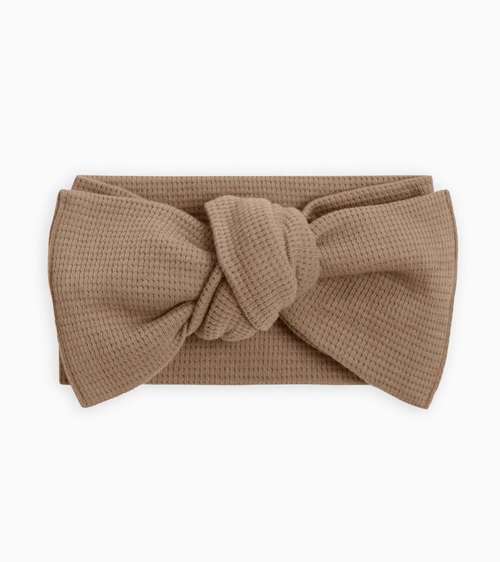 Waffle Knot Bow Wrap in Truffle - Soft, stylish baby blanket for swaddling and comfort. Perfect for newborns.
