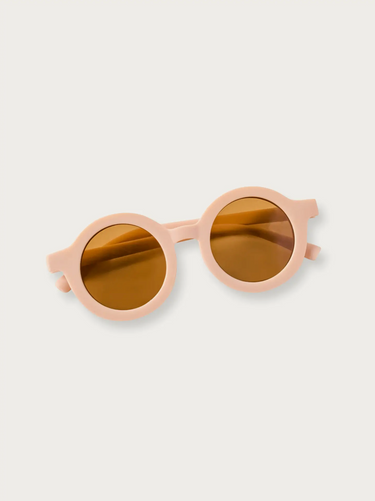 Blush round sunglasses for babies and toddlers, perfect for sunny days.