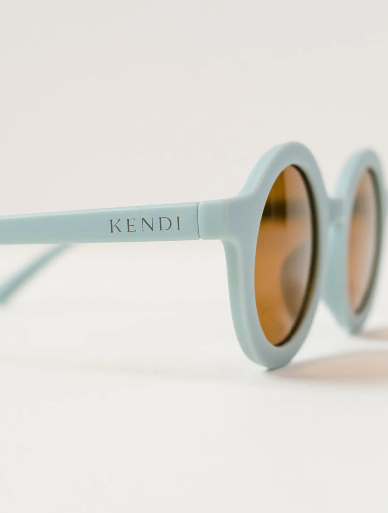 Round ocean-themed sunglasses for babies and toddlers, perfect for sunny days.