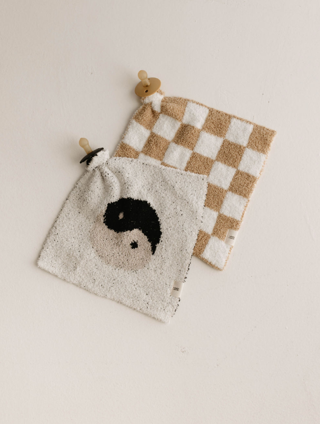 Yin-Yang black and white lovey for babies, soft and cuddly comfort for infants.