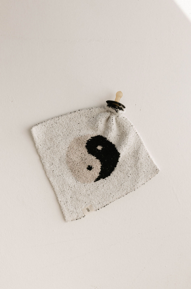 Yin-Yang black and white lovey for babies, soft and cuddly comfort for infants.