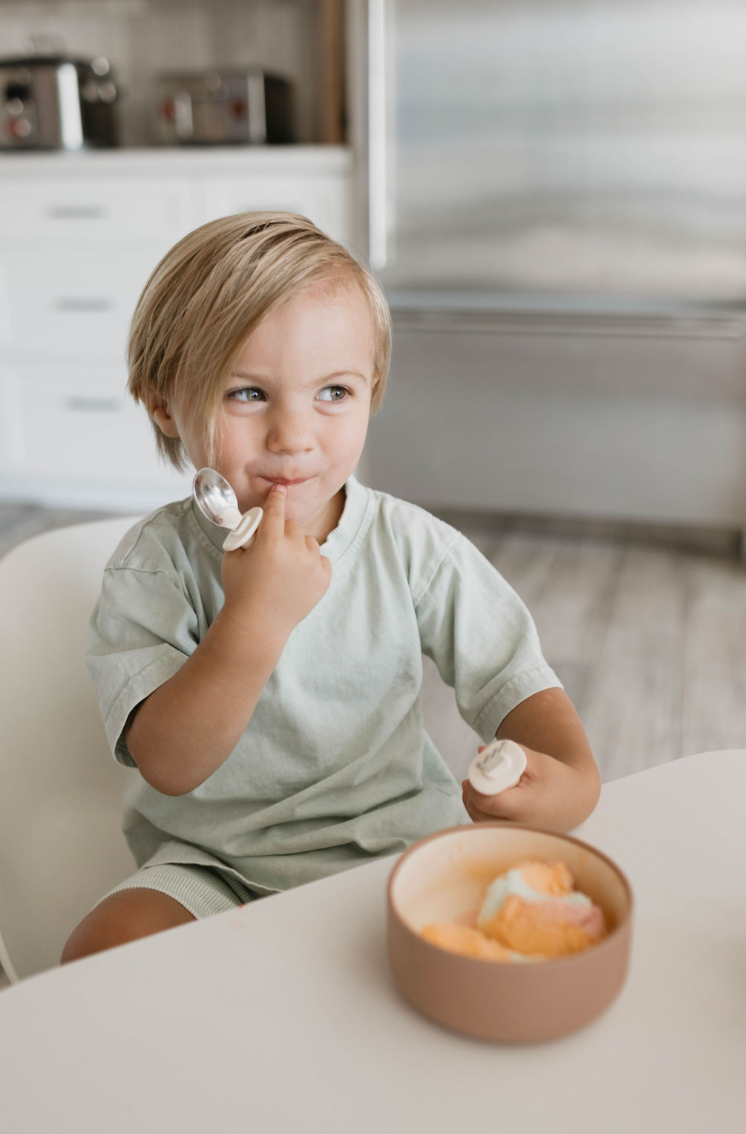 Silicone bowl in desert brown color, perfect for babies and toddlers. Durable and safe for mealtime.