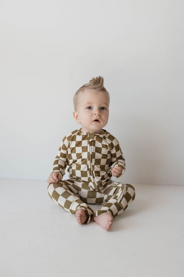 Bamboo zip pajamas in olive checkerboard pattern for babies, soft and cozy sleepwear.