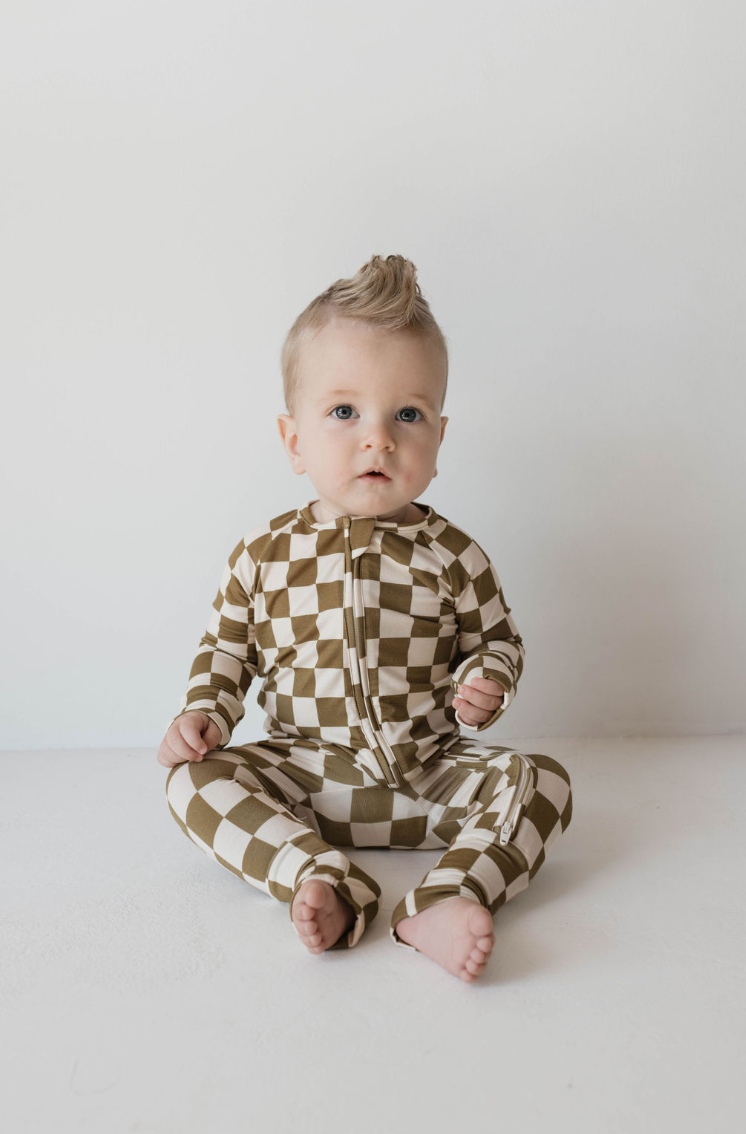 Bamboo zip pajamas in olive checkerboard pattern for babies, soft and cozy sleepwear.