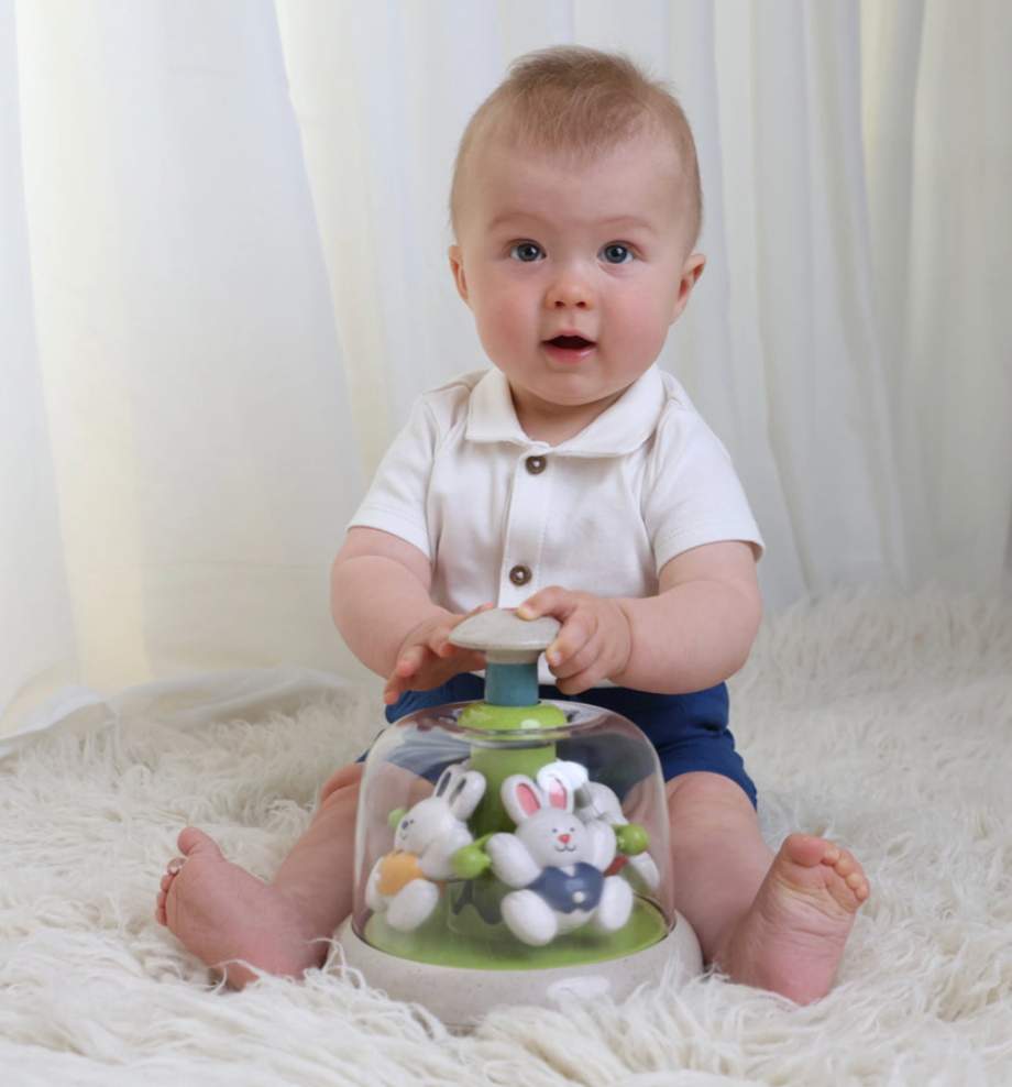 "Rabbit Carousel early learning toy for babies, promoting sensory play and motor skills development."