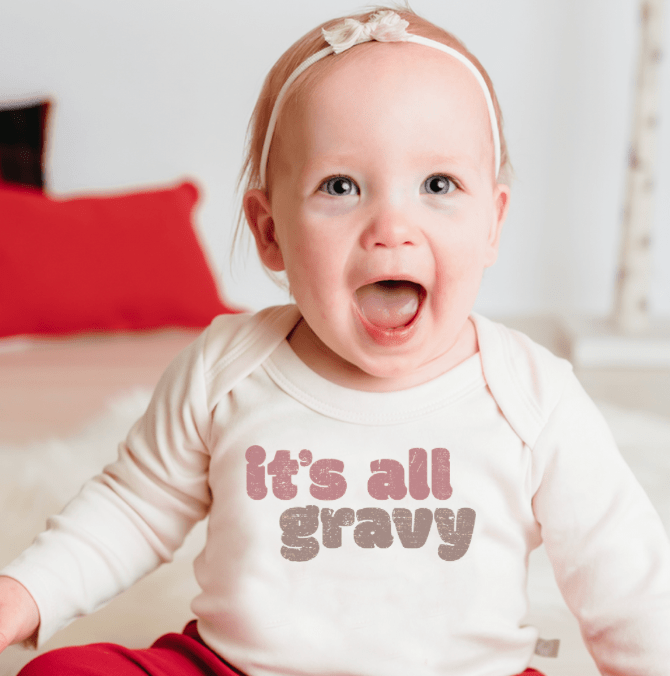 Long sleeve graphic bodysuit for babies, featuring "All Gravy" design, perfect for stylish comfort.