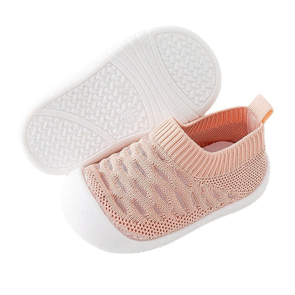 Pink baby first walkers from angle 3, perfect for little ones taking their first steps.
