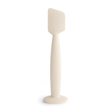 Diaper cream applicator for easy, mess-free application on baby's skin.