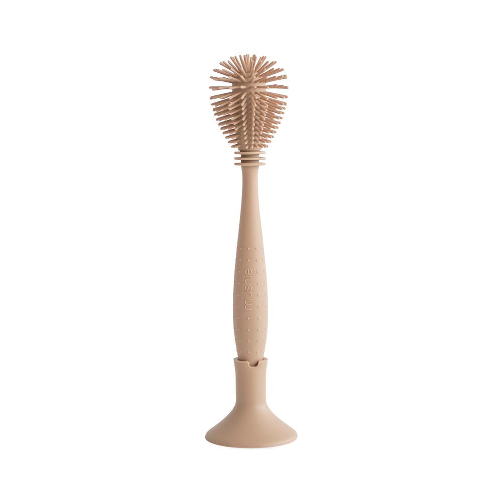 Silicone baby bottle brush for effective and gentle cleaning of baby bottles and accessories.