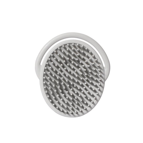 Haakaa Silicone Shampoo Brush for babies, perfect for gentle scalp care and oral hygiene.
