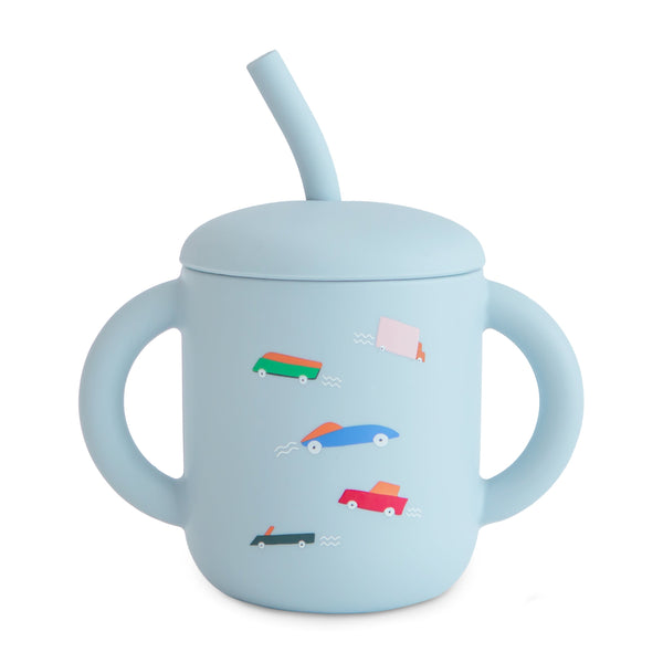 Silicone training cup with straw, perfect for toddlers learning to drink independently. Angle view 14.