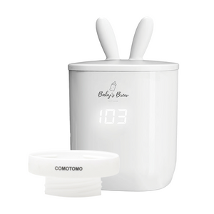 Portable bottle warmer with one adapter, shown from angle 2, perfect for on-the-go feeding.