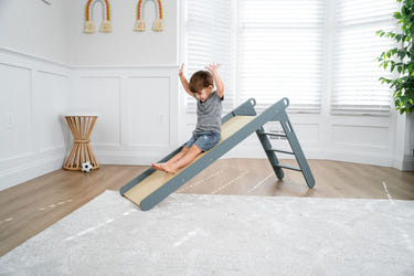 Holland Wooden Folding Slide for indoor playtime fun, perfect for toddlers and small spaces.