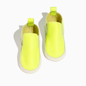 Extra yellow slip-on baby shoes for easy wear and comfort, perfect for little feet.