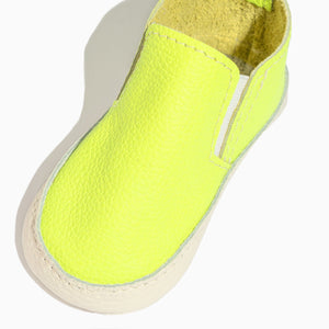 Extra yellow slip-on baby shoe, angle 2, perfect for easy wear and comfort for little feet.