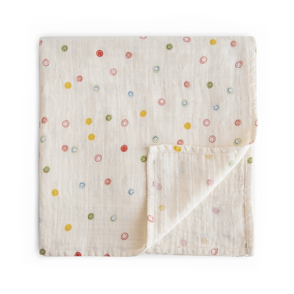 Organic cotton muslin swaddle blanket for babies, soft and breathable, perfect for cozy sleep and comfort.