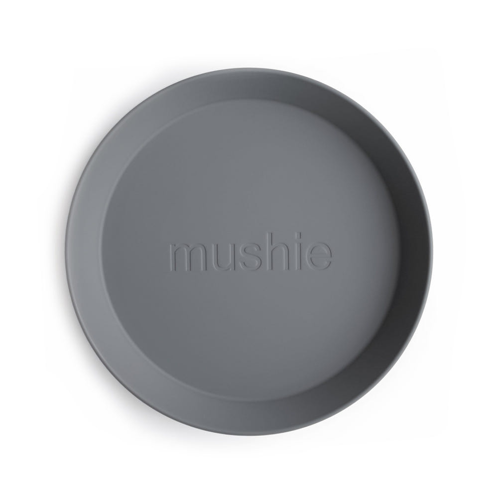 Round dinnerware plates for babies, perfect for mealtime with vibrant colors and safe materials.