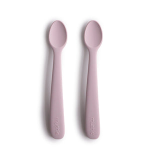 Silicone feeding spoons for babies, angled view showcasing soft, safe design for easy feeding.