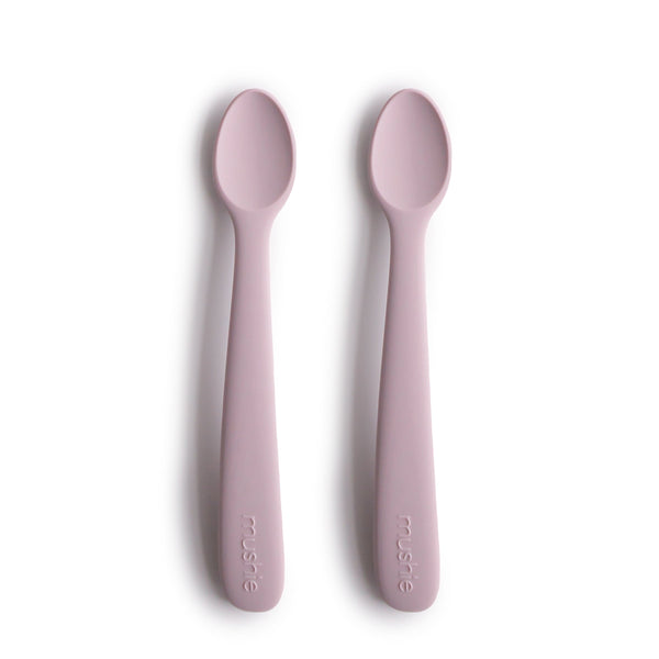 Silicone feeding spoons for babies, angled view showcasing soft, safe design for easy feeding.