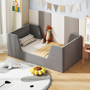 Soft velvet toddler bed frame with safety rails, perfect for a cozy and secure sleep environment.