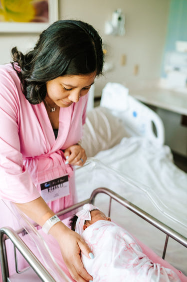 Solid pink Mommy robe for new mothers, offering comfort and style for everyday wear.