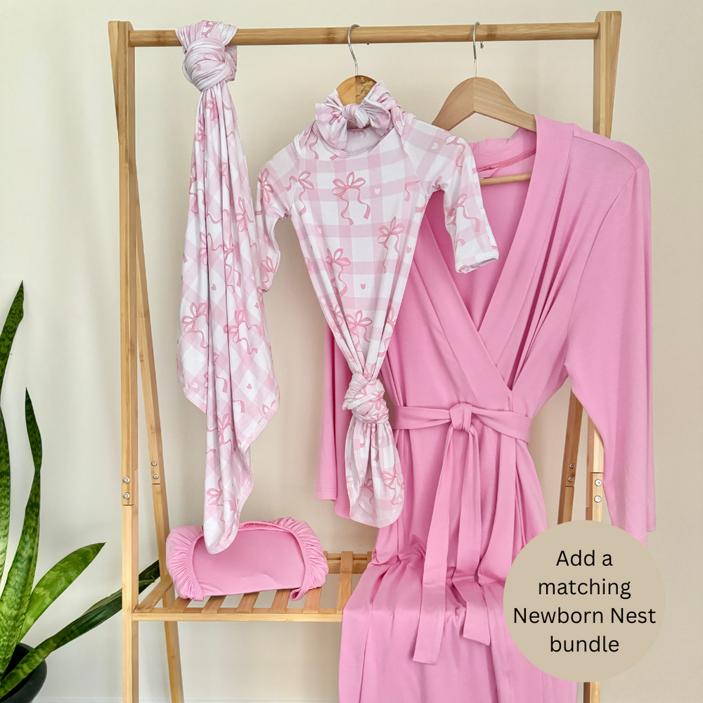 Solid pink Mommy robe for new mothers, offering comfort and style for everyday wear.