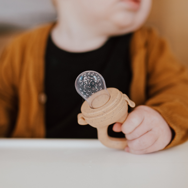 Modern Mod Feeder: Stylish and functional baby feeding utensil for easy mealtime.